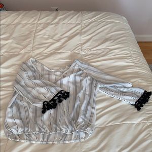 Frilly sleeve black and white shirt